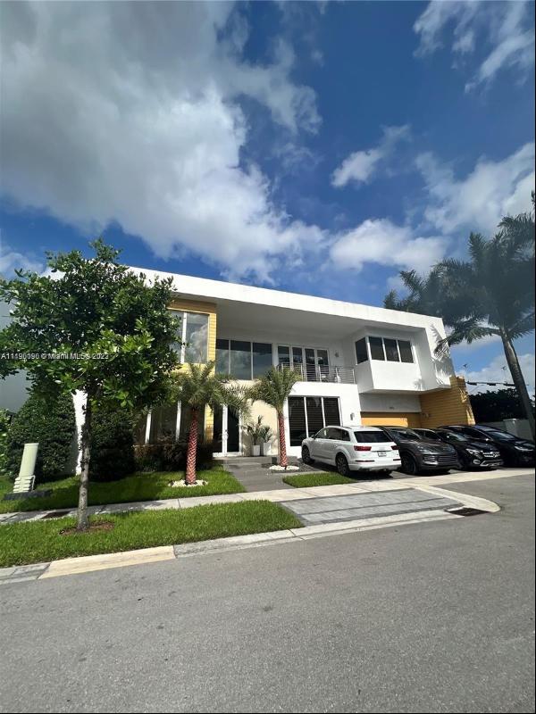 Stunning mansion at the prestigious Modern Doral 75, with an amazing open floor-plan and h