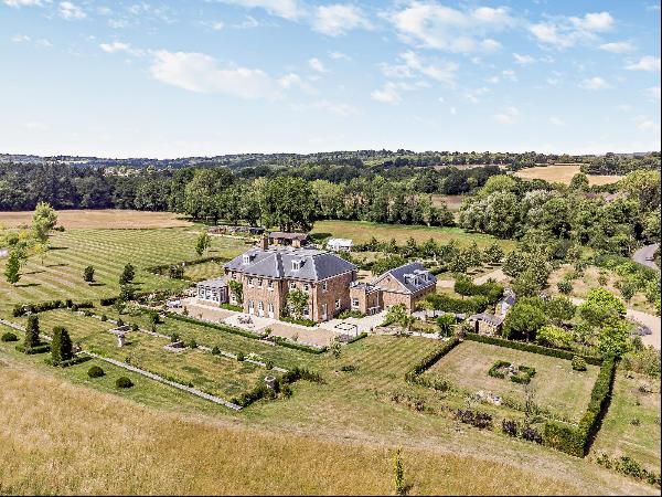 A most impressive Georgian-style country residence of elegant proportions, set within supe