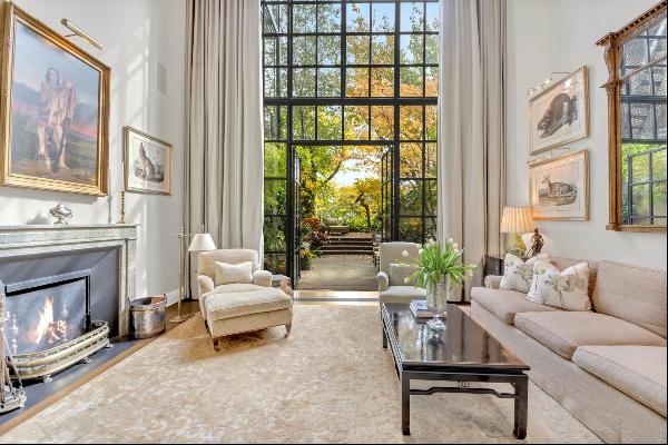 Nestled within the exclusive enclave of Beekman Place, this exceptional townhouse connects