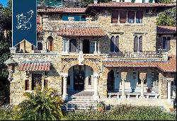 Elegna villa with a park and tennis court in the heart of one of Genoa's most elegant dist