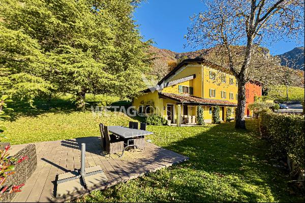 Characteristic countryside villa, nestled entirely in nature with a lake view, in Arogno 