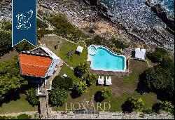 Luxury waterfront property with a panoramic pool for sale between Sanremo and Imperia