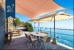 Luxury waterfront property with a panoramic pool for sale between Sanremo and Imperia