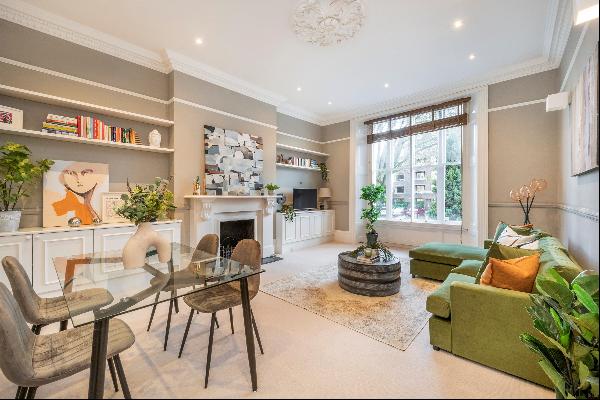 A three bedroom flat for sale on Haverstock Hill, NW3.