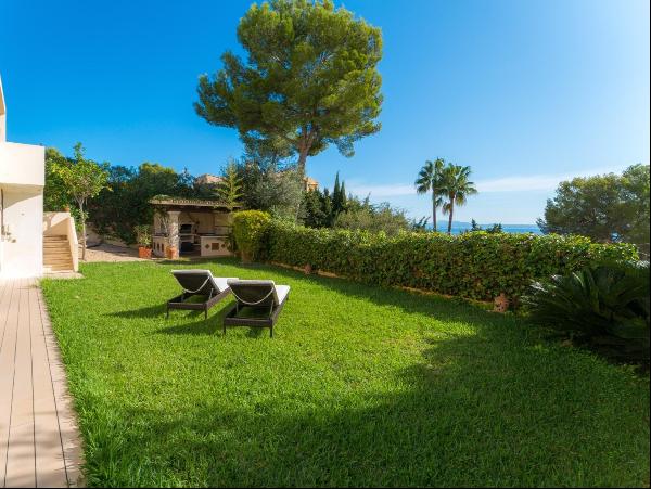 Sea view apartment with private garden in Cas Català, Mallorca