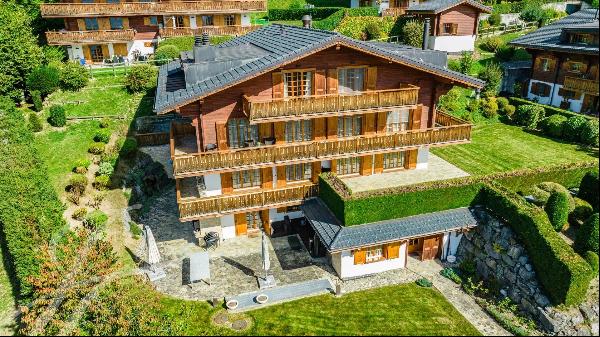 CO-EXCLUSIVE! Fabulous family chalet with panoramic mountain views