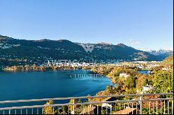 Large roof terrace & breathtaking lake view: modern penthouse apartment in Montagnola for