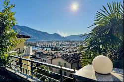 Muralto: modern & bright apartment with large terrace & winter garden for sale
