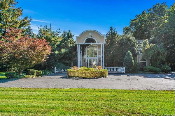 OLD WESTBURY. Here is your opportunity to own an open and spacious Colonial, set privately