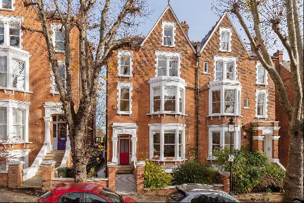 A semi-detached six bedroom house located on Tanza Road NW3
