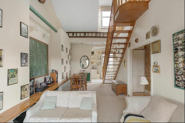 An exceptional second-floor period apartment with a private roof terrace.