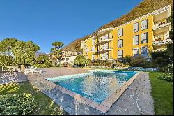 Lugano-Bissone: apartment for sale, with direct access to the lake, outdoor swimming pool
