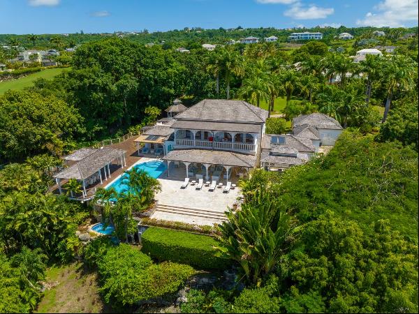 Waterfalls is a luxurious six-bedroom villa set within 1.9 acres of tropical gardens in th
