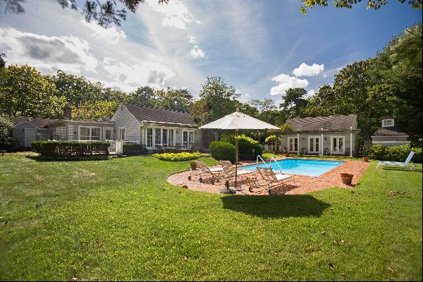 Spend your summer or year entertaining or enjoying the tranquility of this over one acre, 
