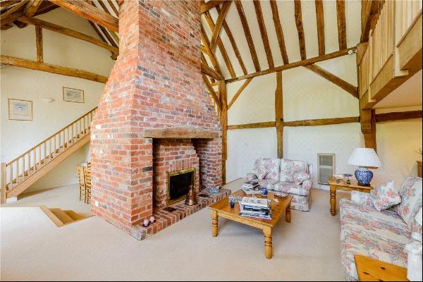 A charming Grade ll listed barn conversion surrounded by open countryside.