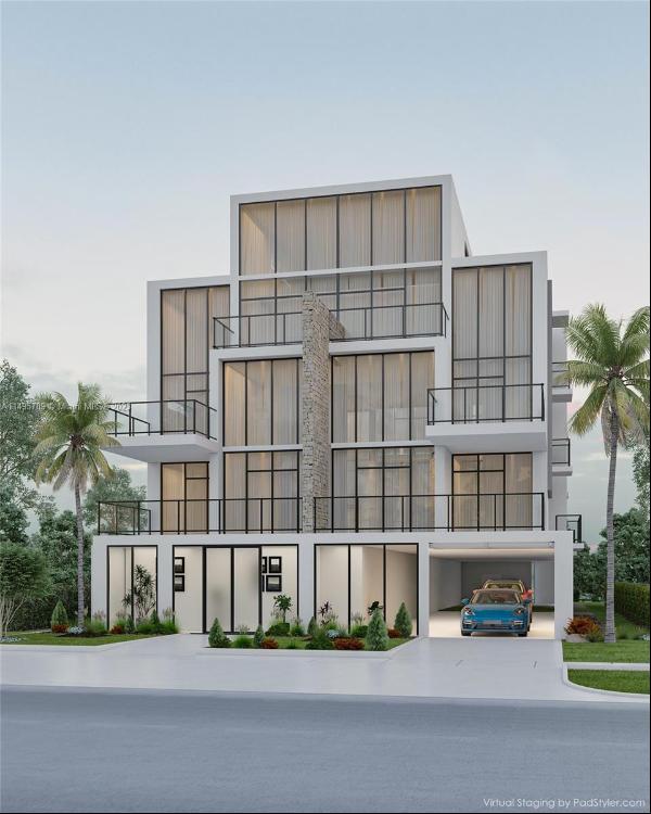 Experience elevated waterfront living in the heart of Miami Beach at ATRIUM, a bespoke col