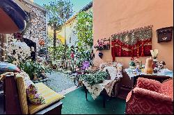 Historic patrician house with courtyard for sale in Brissago