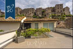 Historical palazzo with a panoramic terrace for sale in the centre of the old town of Bols
