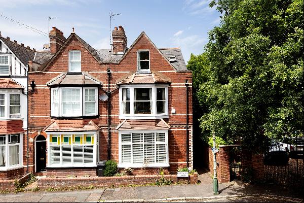 A fine four-bedroom end-of terrace Edwardian townhouse with courtyard garden in thriving a