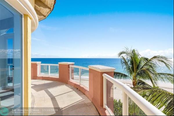 A breathtaking waterfront Villa nestled right on the pristine sand! This luxurious 5 Bd, 5
