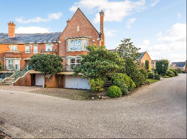 Townhouse situated in a secure, gated development in Virginia Water.
