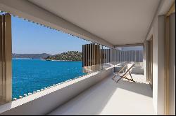 Seafront plot with a project near Trogir