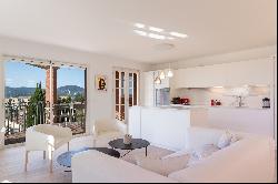 Rare apartment with terraces, open view and parking.