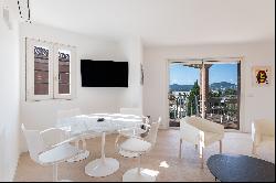 Rare apartment with terraces, open view and parking.