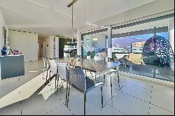 Modern penthouse apartment with lake view for sale in a central location in Locarno