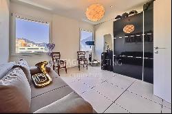 Modern penthouse apartment with lake view for sale in a central location in Locarno