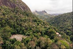 House in the mountains with a water spring and a helipad