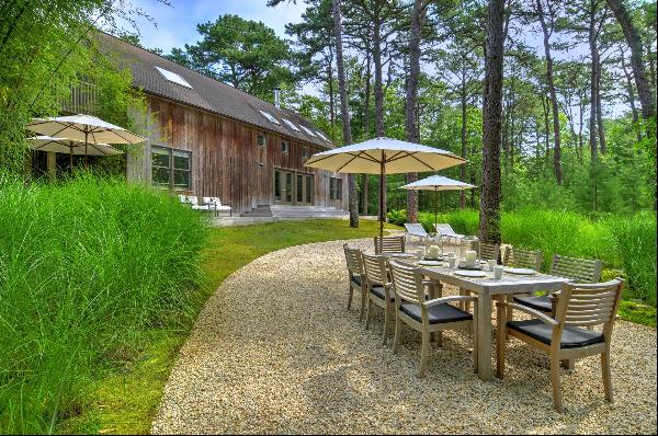 DESIGNER FARMHOUSE RETREAT. Experience the peace and serenity of this architect's own home