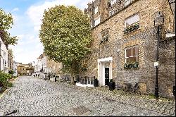 Beautiful house set on a picturesque cobbled mews in Marylebone.