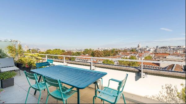 Exceptionally renovated apartment with views over the Eiffel Tower.