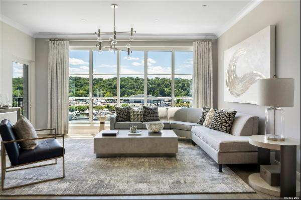 This elegant spacious three-bedroom three-bathroom spans over 1,900 SF and features 10' ce