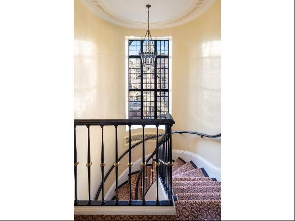 Above the illustrious 820 Park Avenue, a living masterpiece awaits. This exquisite duplex,