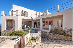 Seafront semi-detached house with a holiday rental license in Cala Rajada