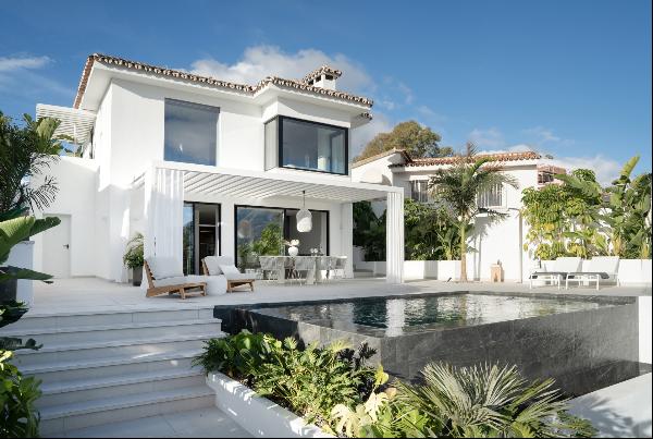 Villa in Nueva Andalucia in three styles: modern-Andalusian-Scandinavian