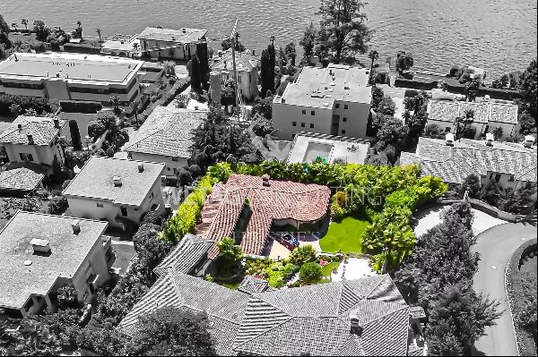 Mediterranean jewel, section of a majestic villa, for sale in Morcote with a view of Lake