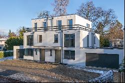 New build: Sophisticated semi-detached house with Bauhaus aesthetics, heat pump and photo