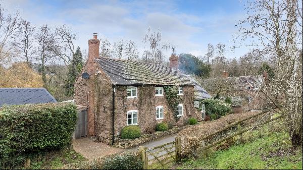 A beautiful period home with annex and stunning gardens set within an area of outstanding 