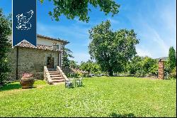 Exclusive panoramic relais with a big park and a vineyard for sale near Arezzo