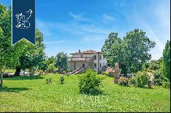 Exclusive panoramic relais with a big park and a vineyard for sale near Arezzo