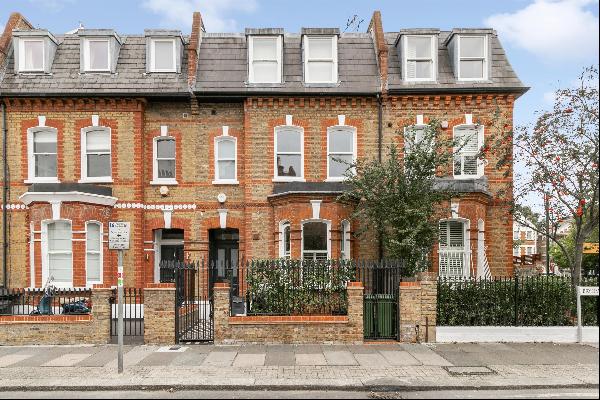 A fantastic four bedroom house on a popular residential road by Battersea Park