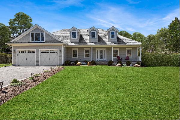 Nestled on .89 acres in the heart of the Hamptons,  this pristine home located on Quail Ru