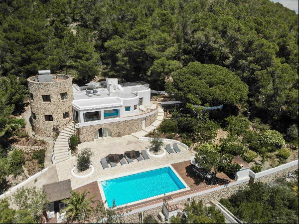 An outstanding four-bedroom villa with a private swimming pool and panoramic sea views in 