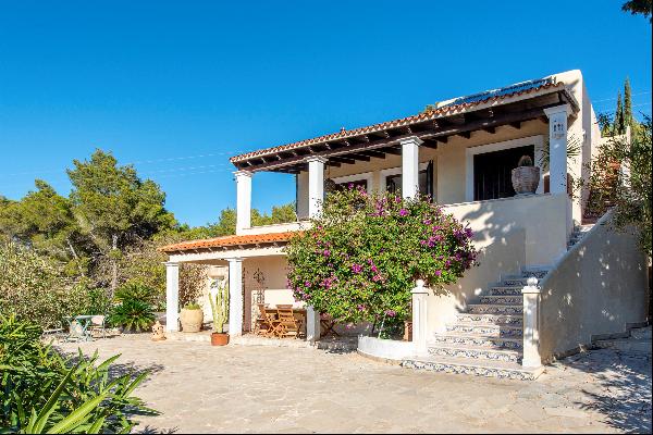 Captivating 3-bedroom house with panoramic sea views, in Santa Eulària des Riu, Ibiza.