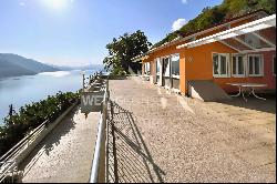 Brissago: modern villa with large terraces & outdoor pool for sale