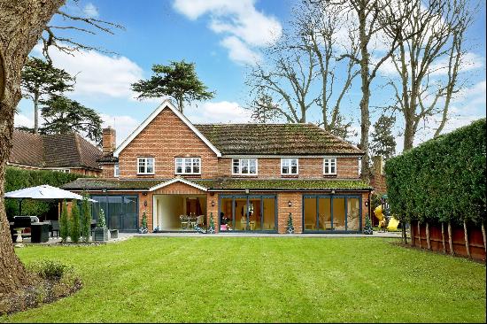 A meticulously designed, modern, six bedroom house on a private gated road in Iver.