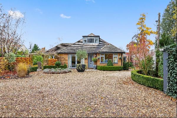 A fantastic and unique home sitting at the end of a long private driveway on the renowned 